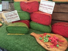Bright clolours of tomato & pesto cheese on a stall at L'Isle Sur La Sorgue market