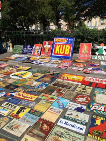 Superb enamelled signs - sadly the Snail Syrup one seems to have been sol